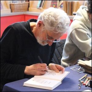 Patrick McDonnell signing books