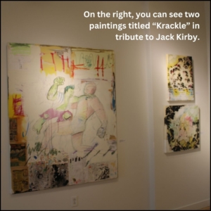 a large painting on the left with the Hulk fighting the giant version of Ant Man in a collage; on the right, there are two smaller paintings titled "Krackle" to emulated Jack Kirby's signature black circles that expressed cosmic nature and magic.