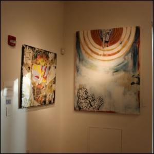 two of McDonnell's paintings in a corner of the gallery